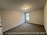 268 Brickhill Drive Raeford, NC 28376 - Photo 13 of 21 an empty room with wooden floor and windows