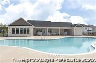268 Brickhill Drive Raeford, NC 28376 - Photo 19 of 21 a view of a house with a swimming pool