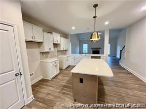 268 Brickhill Drive Raeford, NC 28376 - Photo 4 of 21 a kitchen with a sink stainless steel appliances and white cabinets