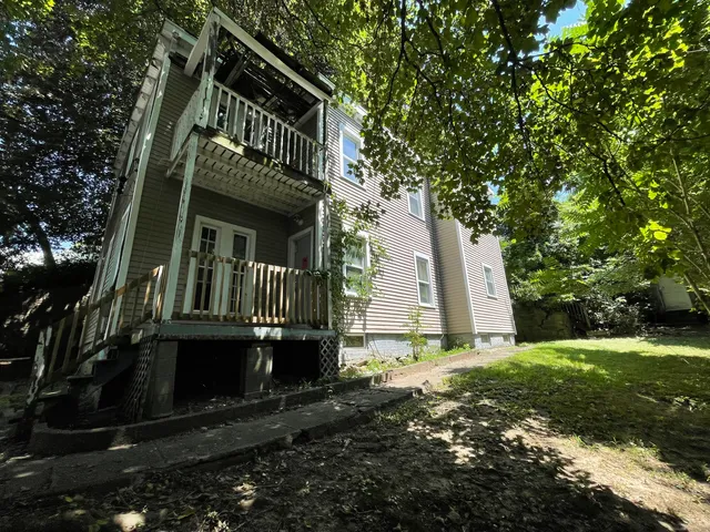 a front view of house with yard