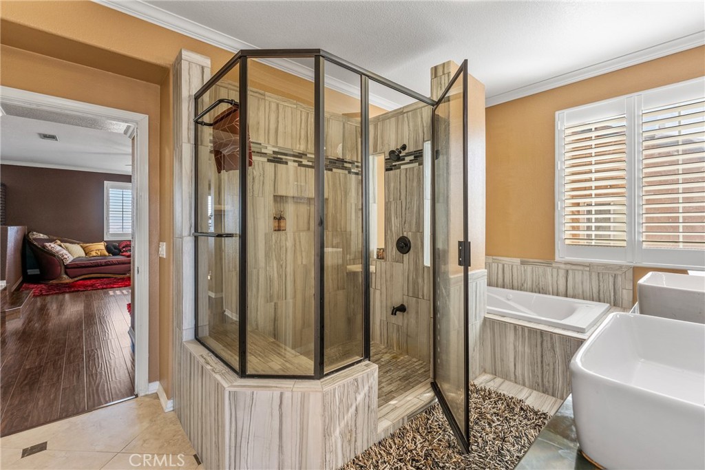 18458 Hidden Ranch Road Riverside, CA 92508 - Photo 5 of 8 a bathroom with a shower and a tub