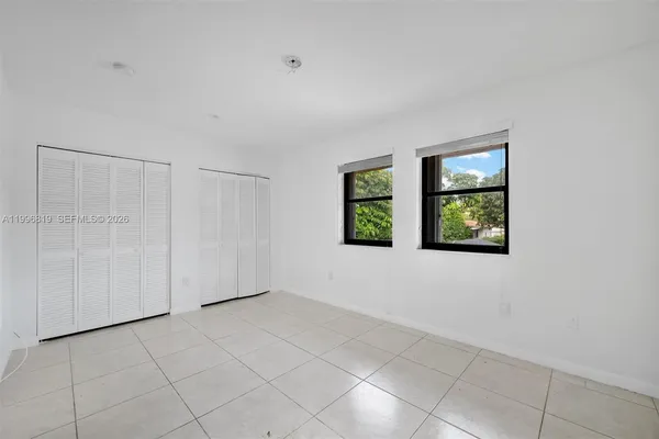 an empty room with windows
