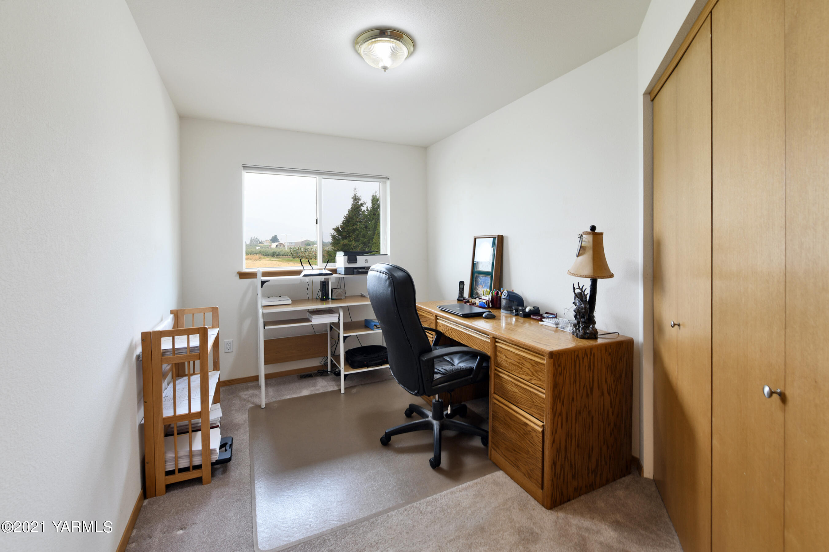 1511 Rosenkranz Road Tieton, WA 98947 - Photo 22 of 41 a view of a workspace with furniture and a window