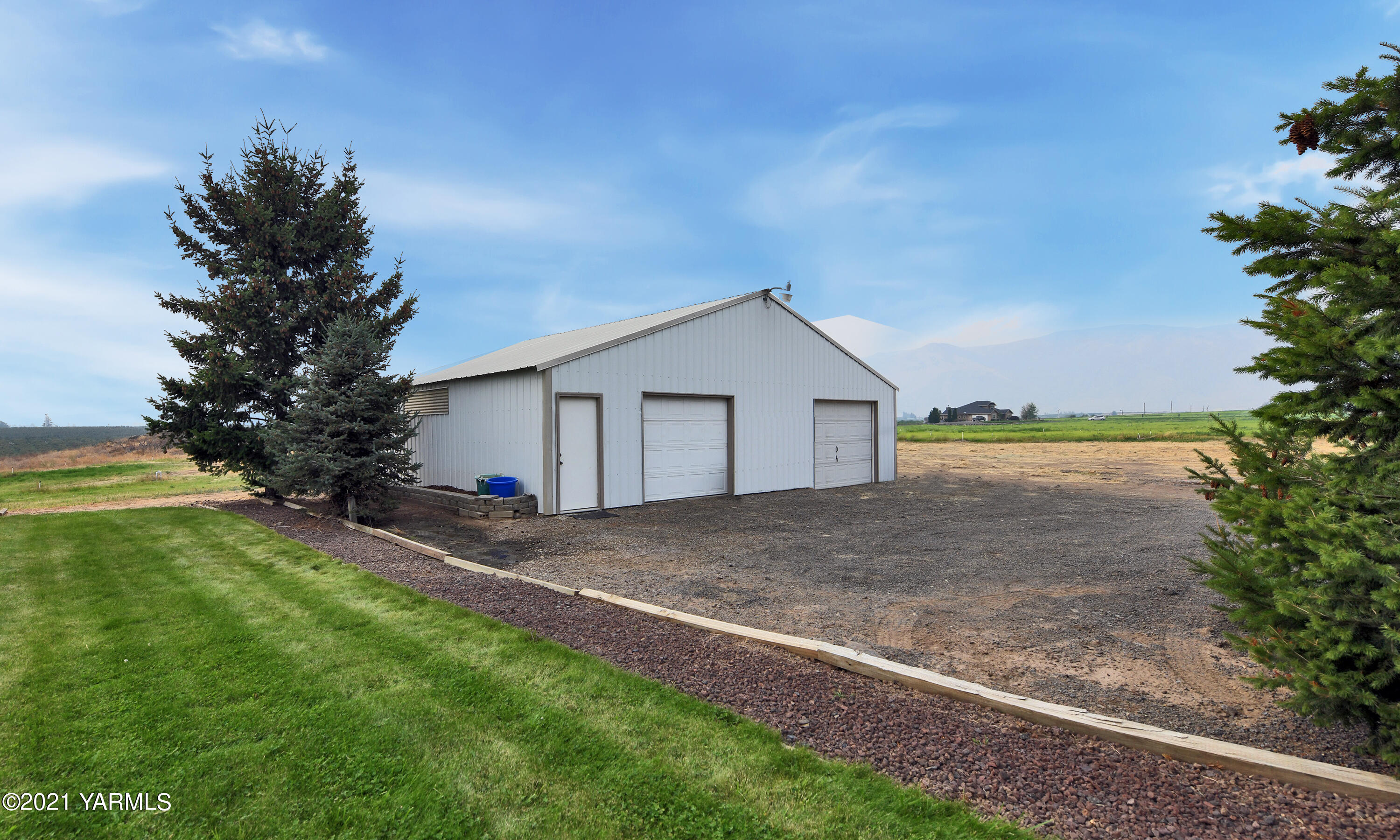 1511 Rosenkranz Road Tieton, WA 98947 - Photo 27 of 41 a view of backyard of house with green space