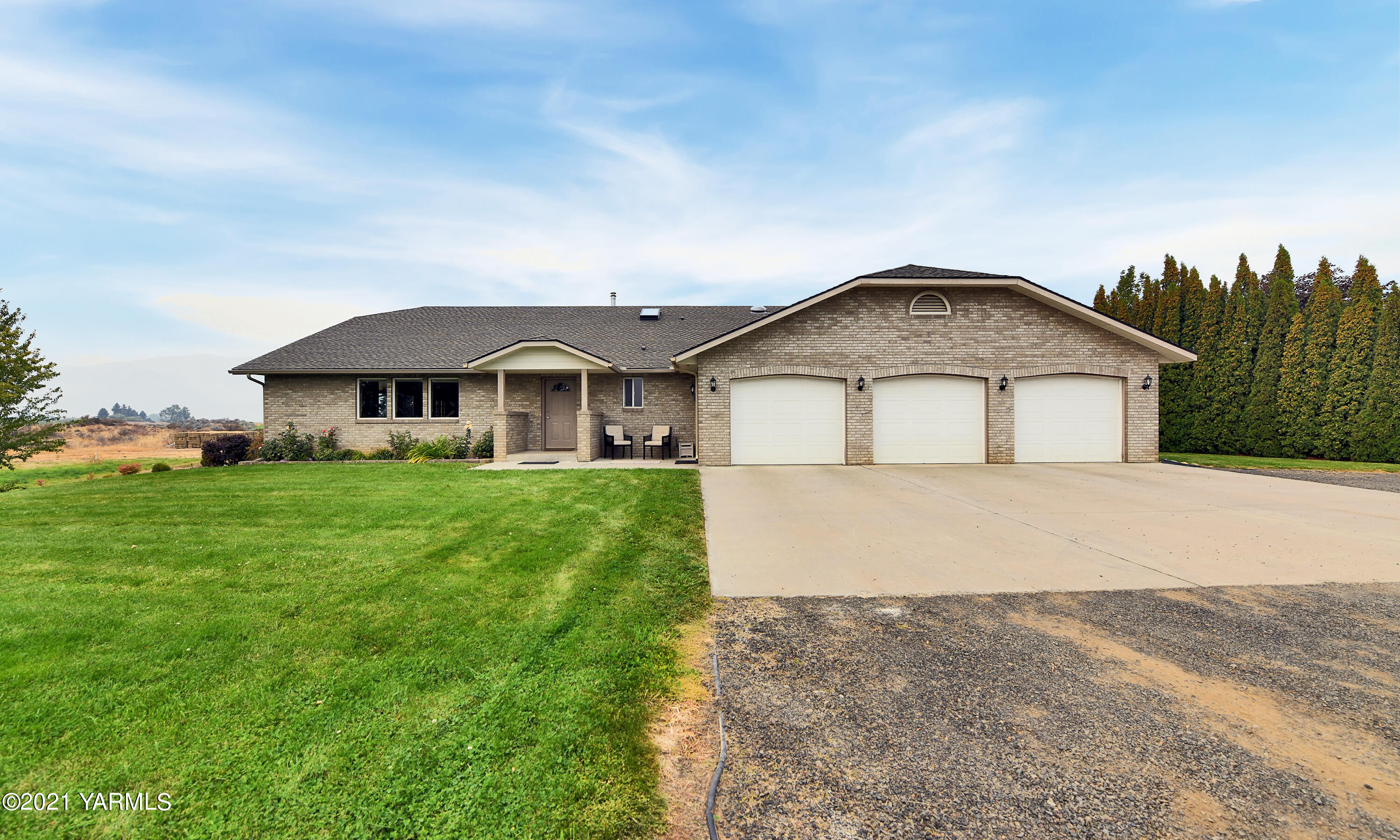 1511 Rosenkranz Road Tieton, WA 98947 - Photo 34 of 41 a front view of a house with a yard