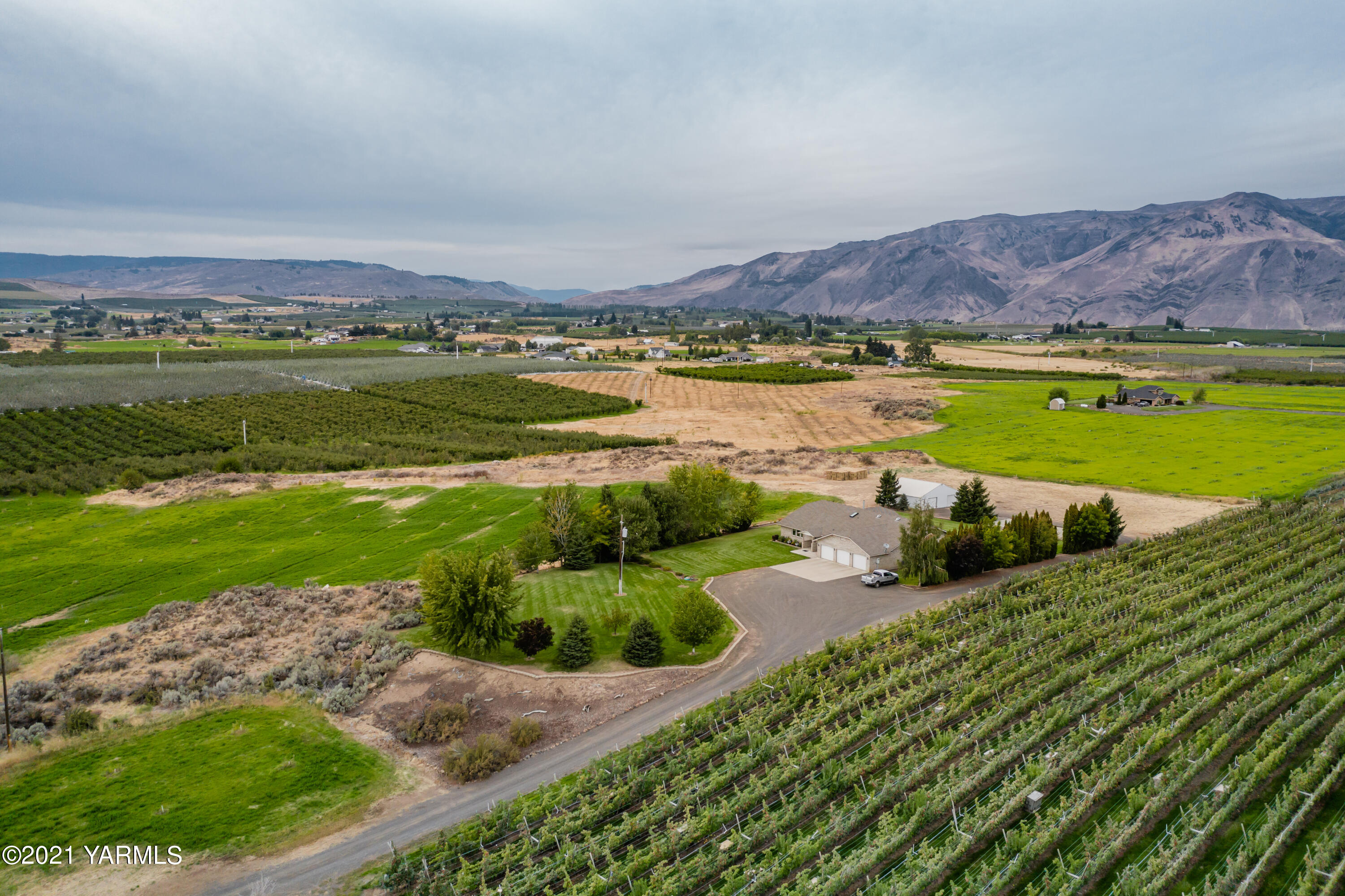 1511 Rosenkranz Road Tieton, WA 98947 - Photo 35 of 41 an aerial view of a house with a garden