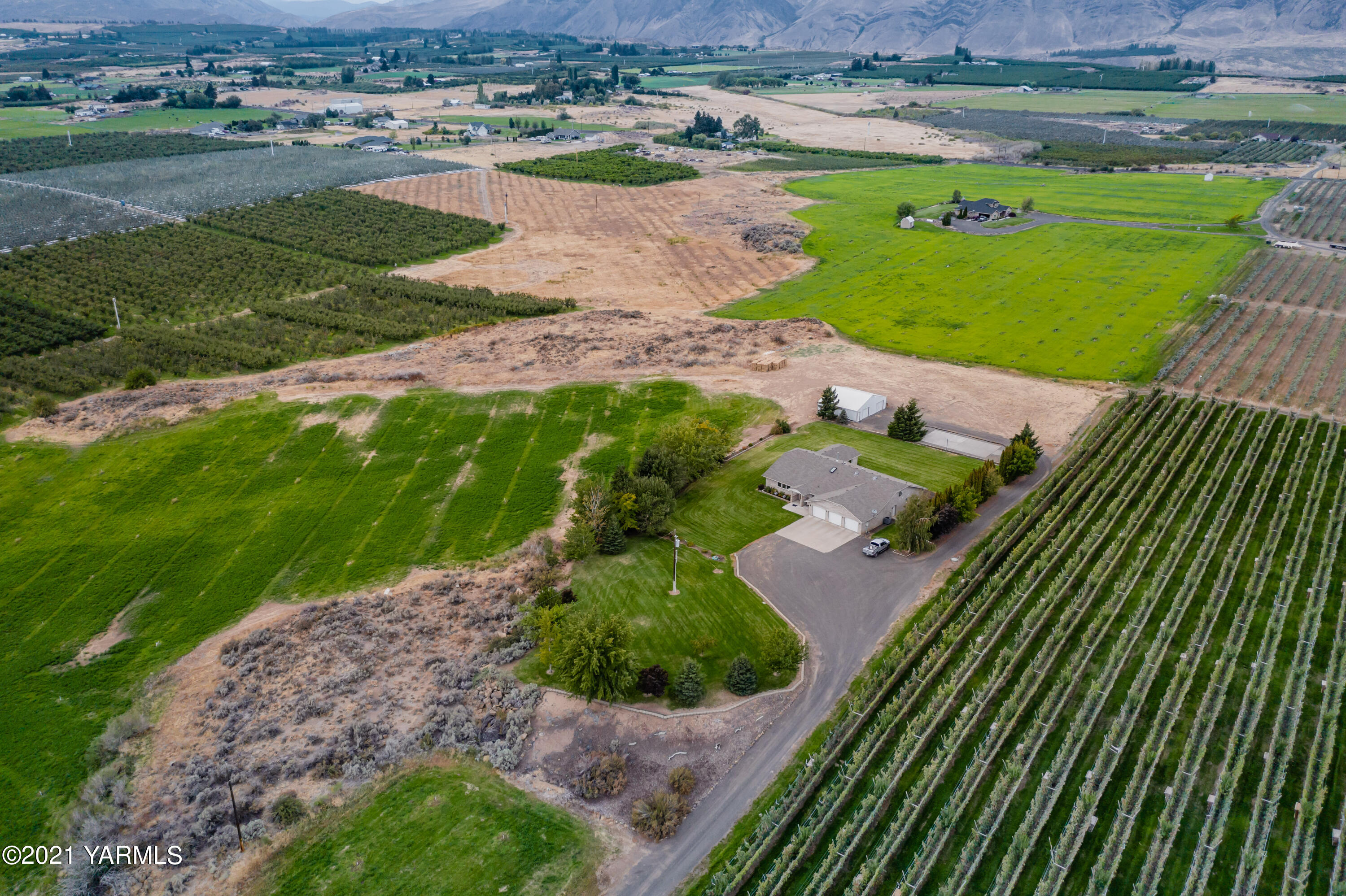 1511 Rosenkranz Road Tieton, WA 98947 - Photo 39 of 41 an aerial view of a house with a yard