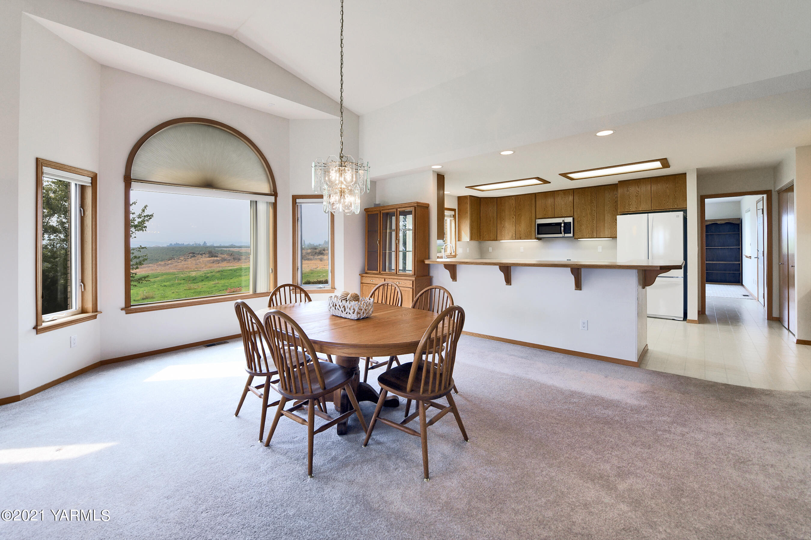 1511 Rosenkranz Road Tieton, WA 98947 - Photo 6 of 41 a view of a dining room with furniture window and wooden floor