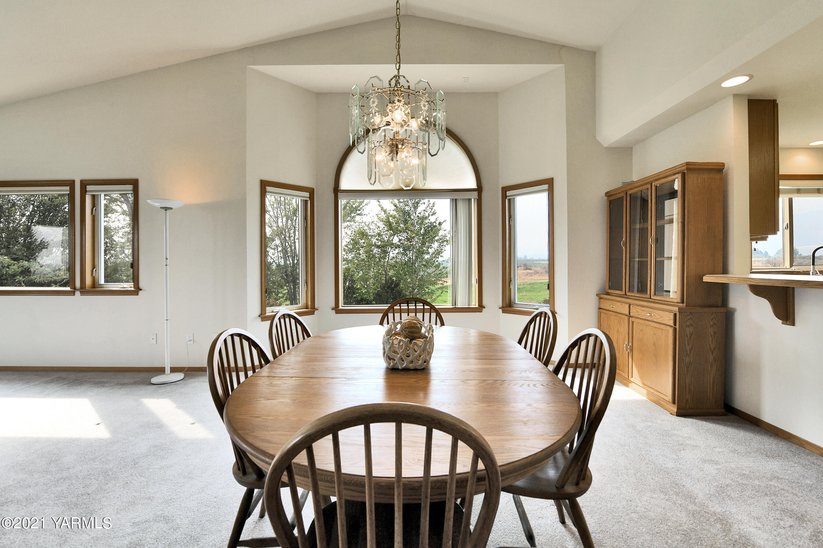 1511 Rosenkranz Road Tieton, WA 98947 - Photo 7 of 41 a dining room with furniture a chandelier and window
