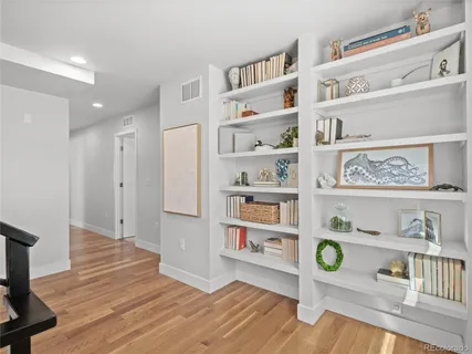 a view of an entryway with wooden floor