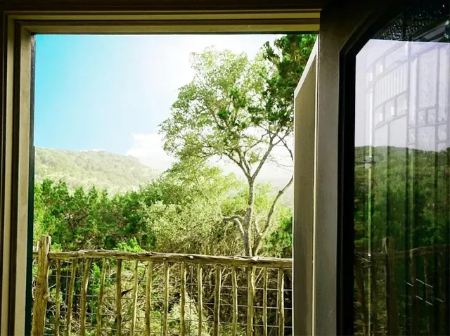 a view of a balcony with lake view