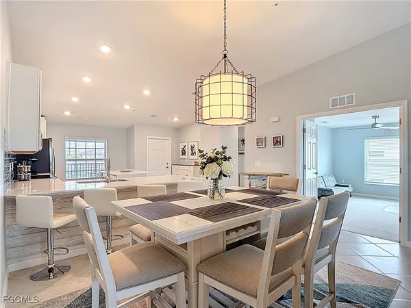 a view of a dining room with furniture