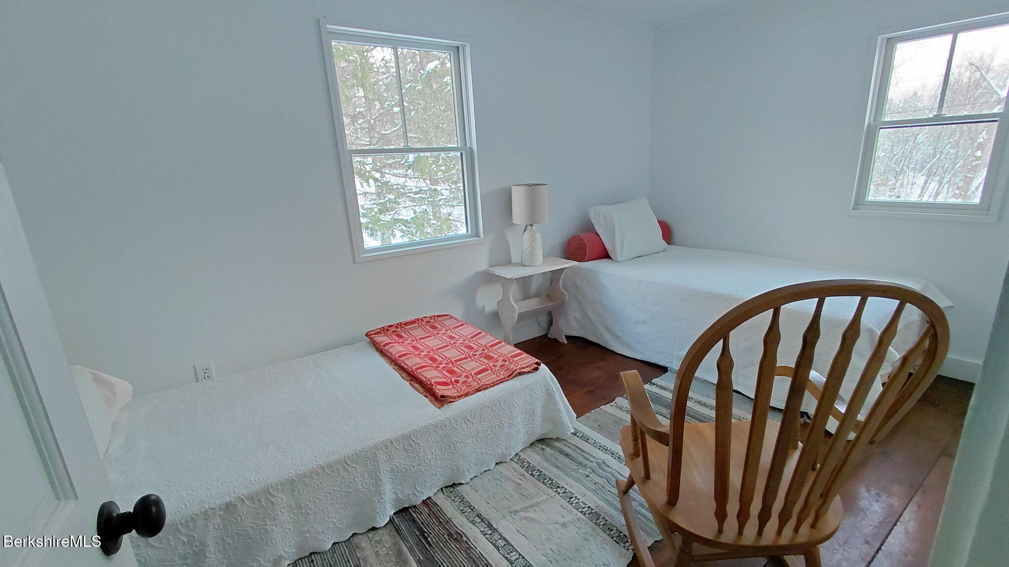 95 Water Farm Road Sheffield, MA 01257 - Photo 16 of 27 a bedroom with two beds and a window