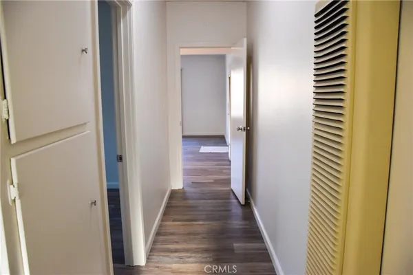 a view of kitchen with furniture and a window