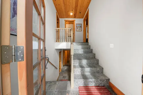 a view of entryway with a front door