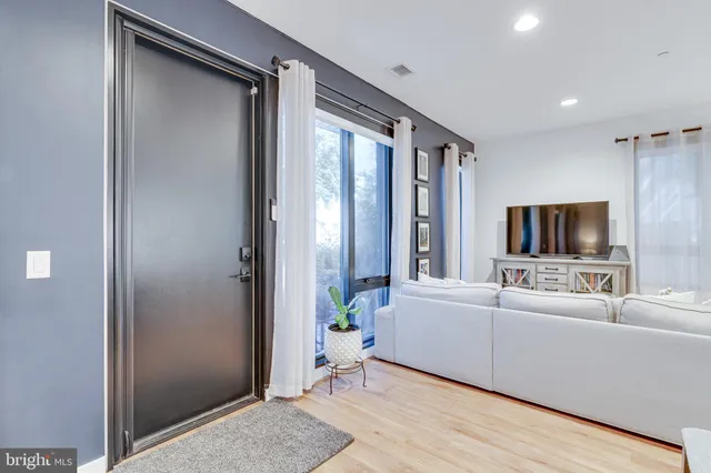 a front view of a house with a porch