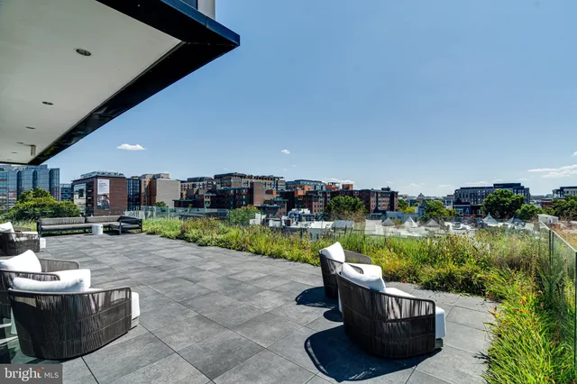 a view of a chairs and tables in the patio