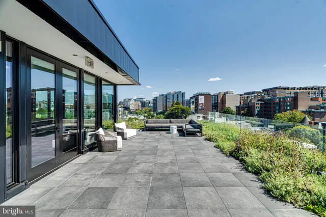 a view of a swimming pool and a chairs