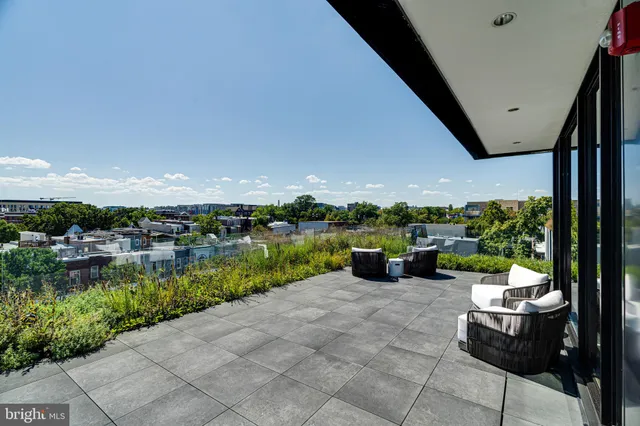 a view of a pathway both side of house