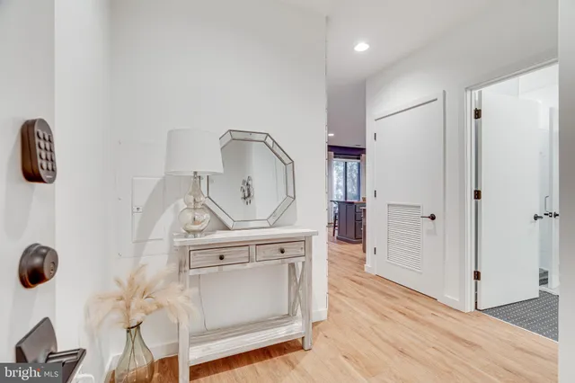 a bathroom with a shower and a sink