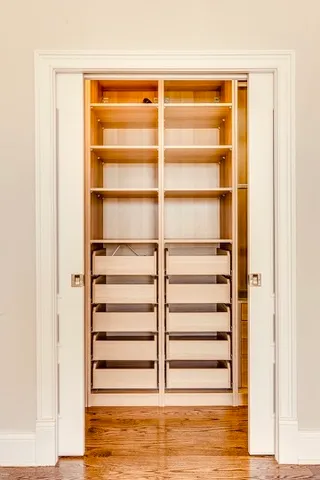 a view of a room with storage and utility room