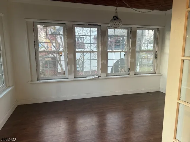 a bathroom with a toilet and shower