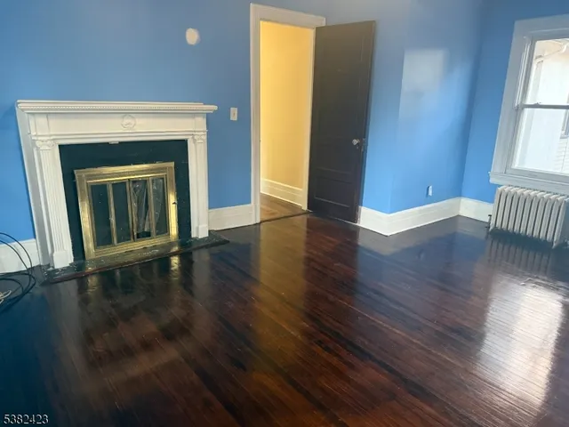 a bathroom with a tub and shower