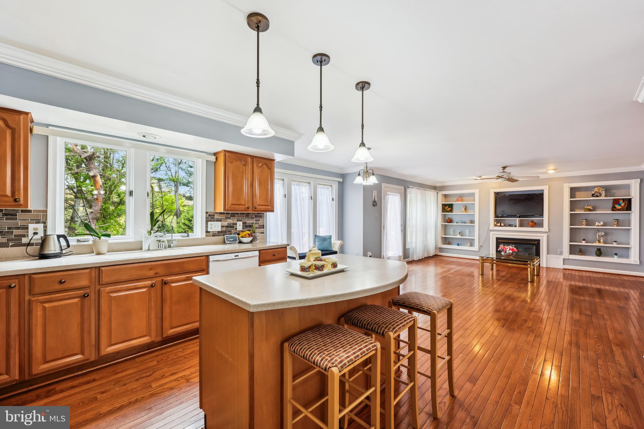 6132 Cornwall Terrace Frederick, MD 21701 - Photo 12 of 48 a kitchen with stainless steel appliances granite countertop a stove and a wooden floors