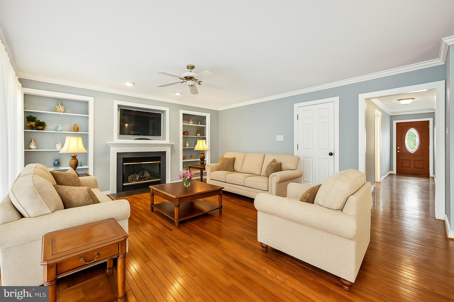6132 Cornwall Terrace Frederick, MD 21701 - Photo 14 of 48 a living room with furniture fireplace and a flat screen tv