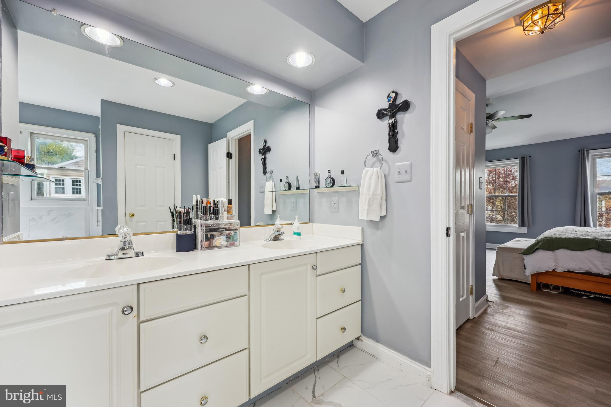 6132 Cornwall Terrace Frederick, MD 21701 - Photo 20 of 48 a en suite bathroom with double sink and a mirror