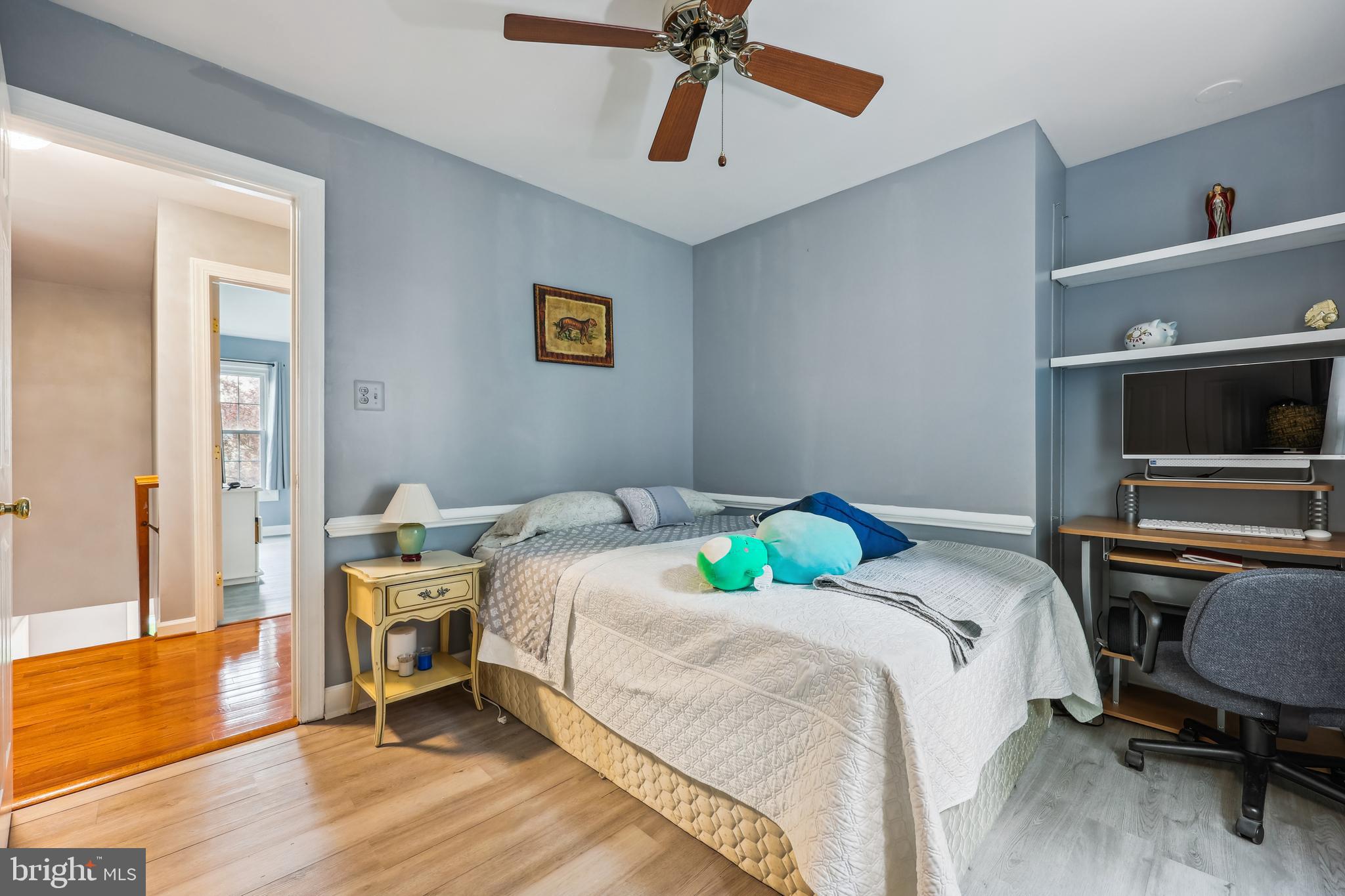 6132 Cornwall Terrace Frederick, MD 21701 - Photo 22 of 48 a bedroom that has a bed and a chair in it