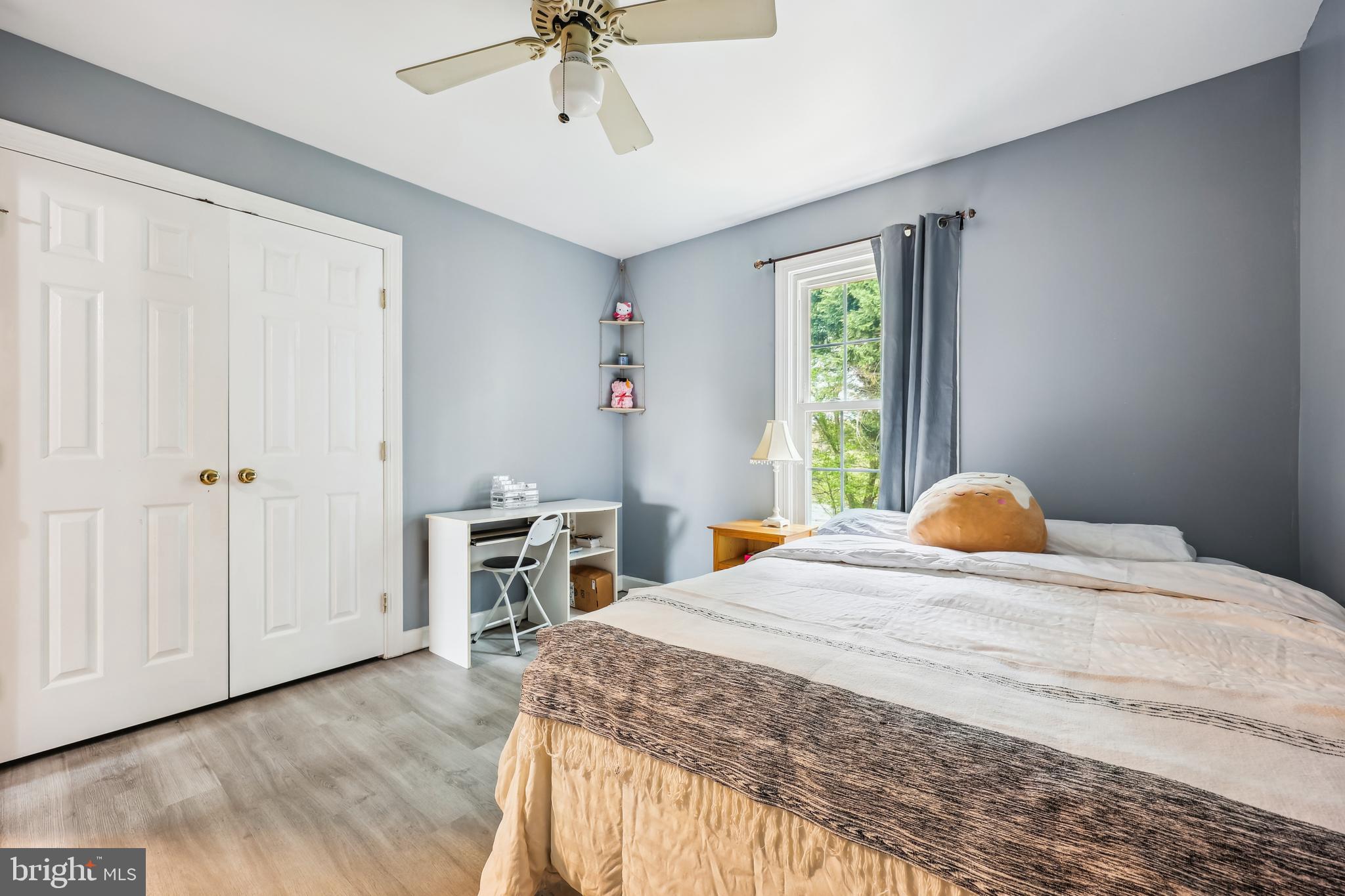 6132 Cornwall Terrace Frederick, MD 21701 - Photo 24 of 48 a bedroom with a bed and a chandelier