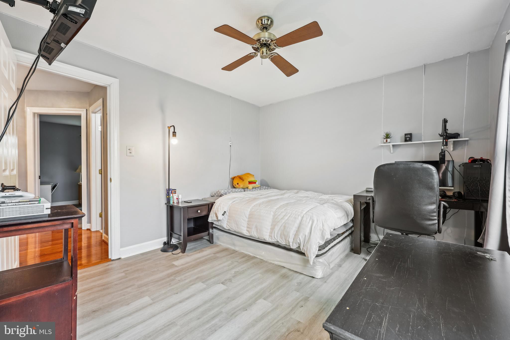 6132 Cornwall Terrace Frederick, MD 21701 - Photo 27 of 48 a bedroom with a bed a desk and chair