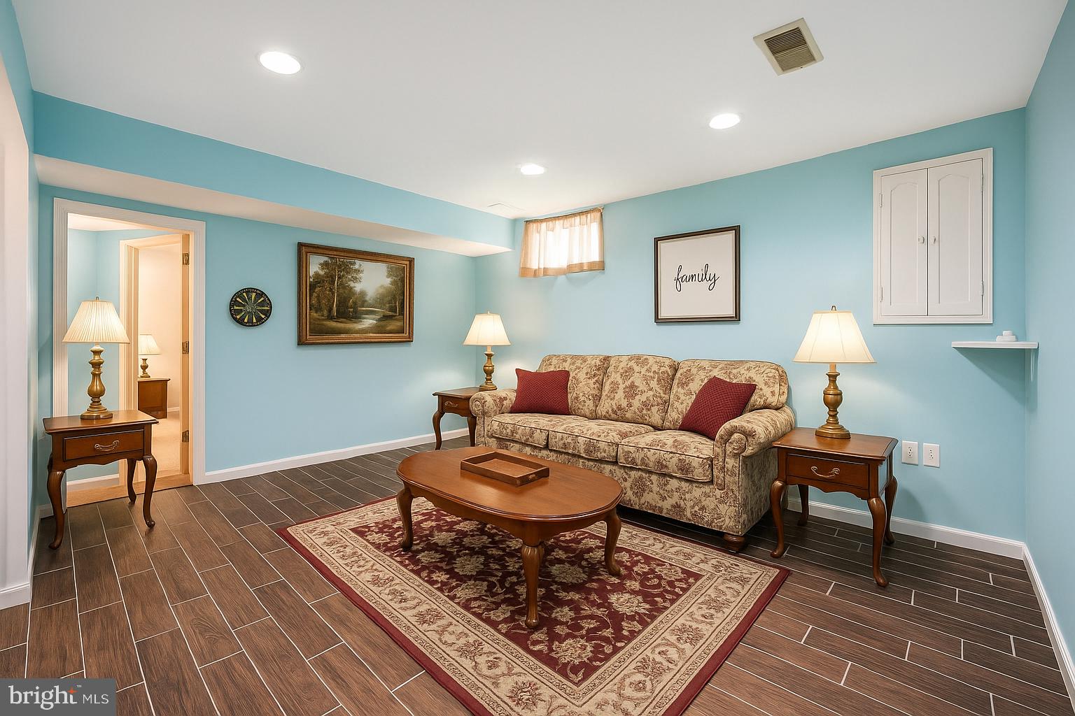 6132 Cornwall Terrace Frederick, MD 21701 - Photo 28 of 48 a living room with furniture and a rug