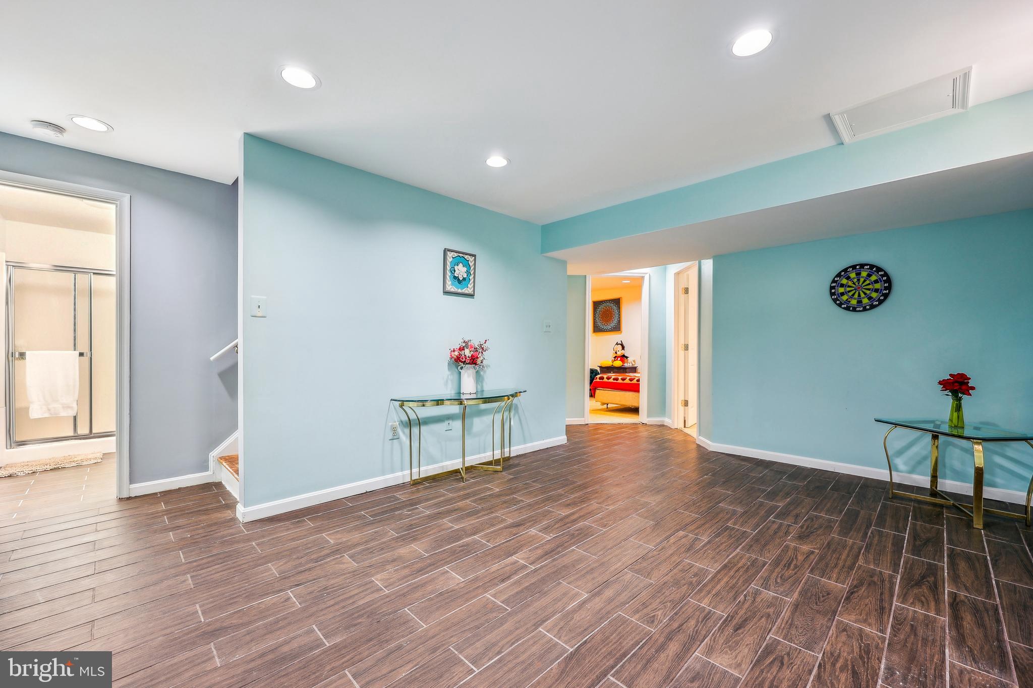 6132 Cornwall Terrace Frederick, MD 21701 - Photo 29 of 48 an empty room with wooden floor and entryway