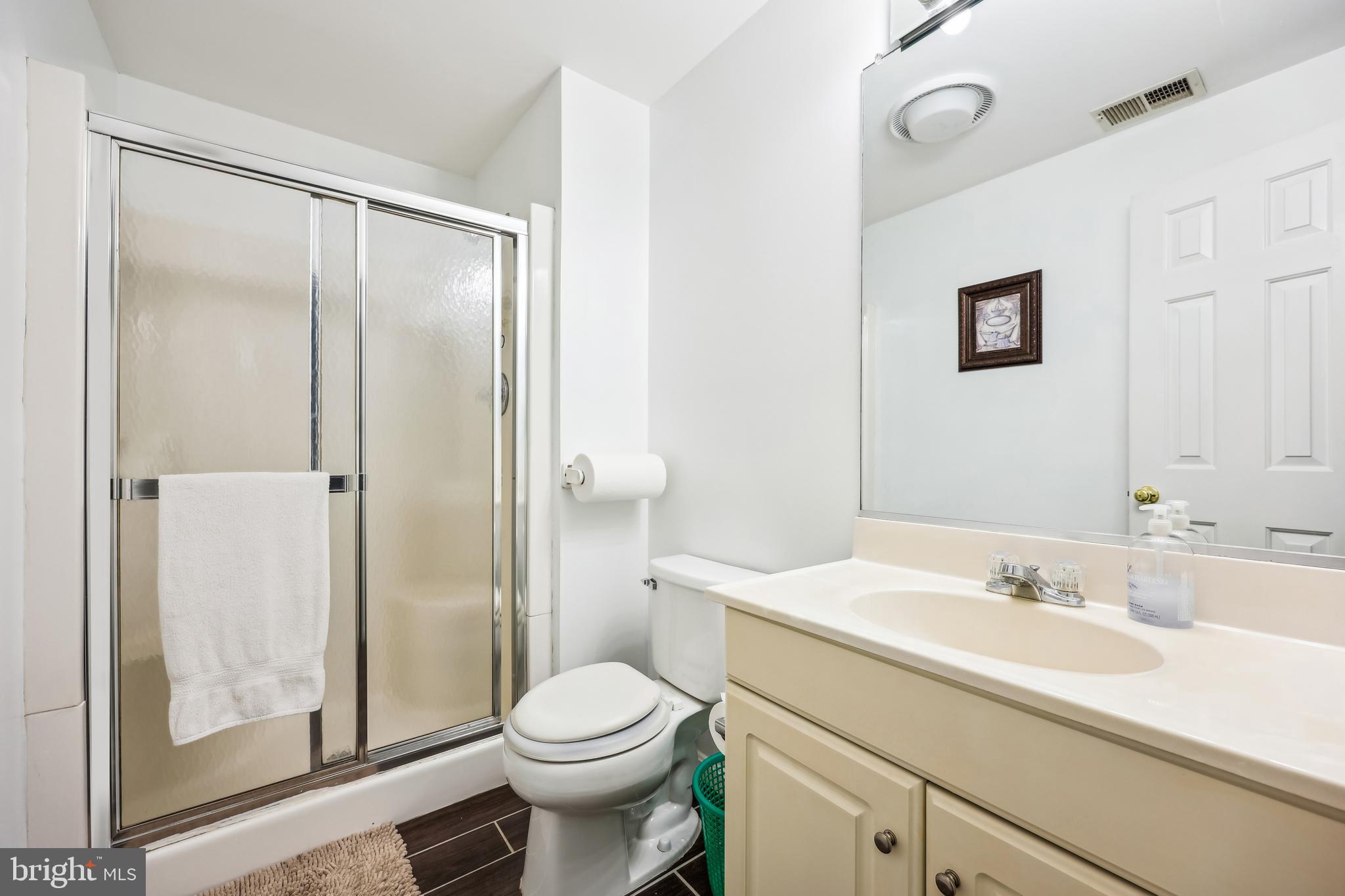 6132 Cornwall Terrace Frederick, MD 21701 - Photo 30 of 48 a bathroom with a sink a toilet and shower