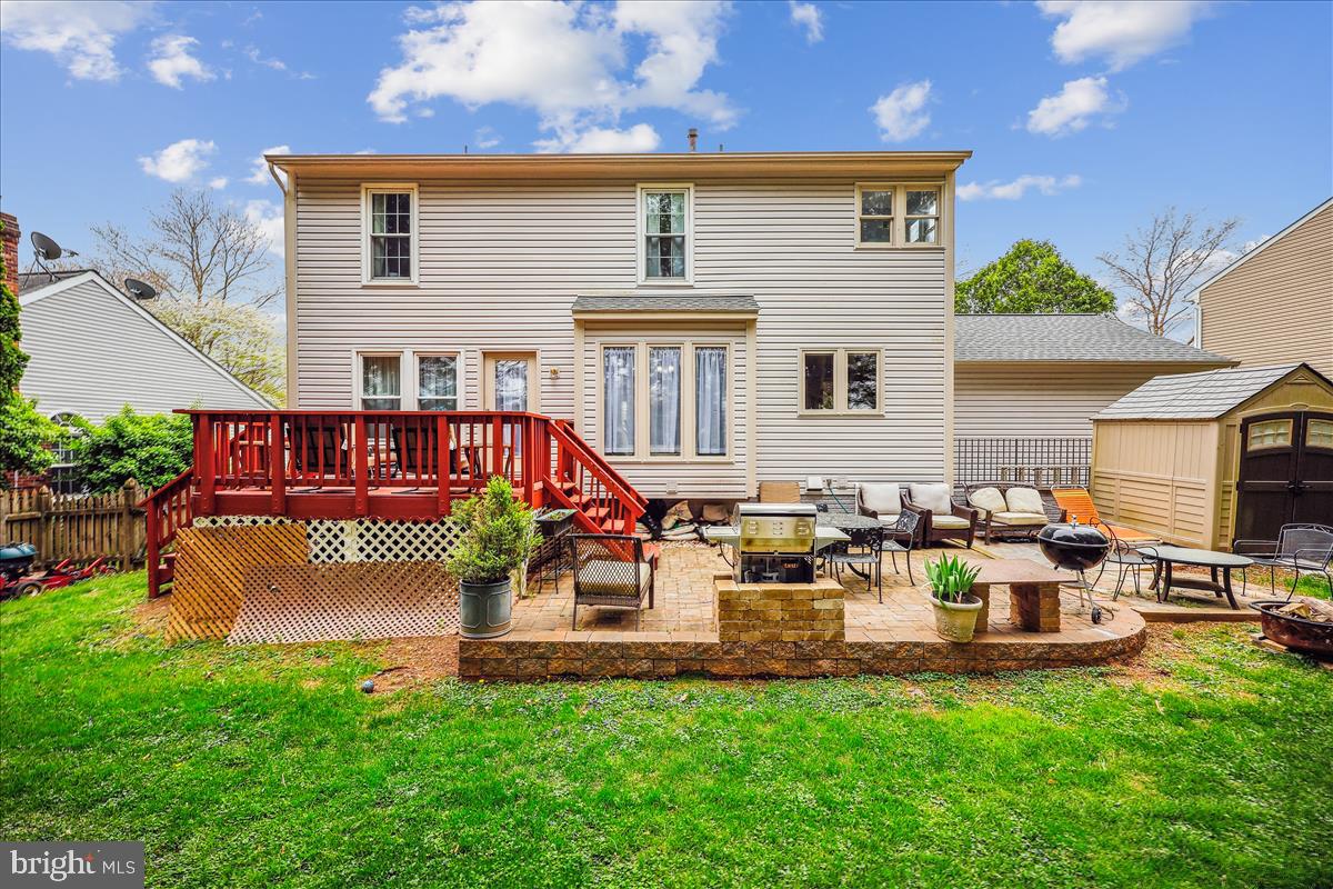 6132 Cornwall Terrace Frederick, MD 21701 - Photo 34 of 48 a front view of a house with garden