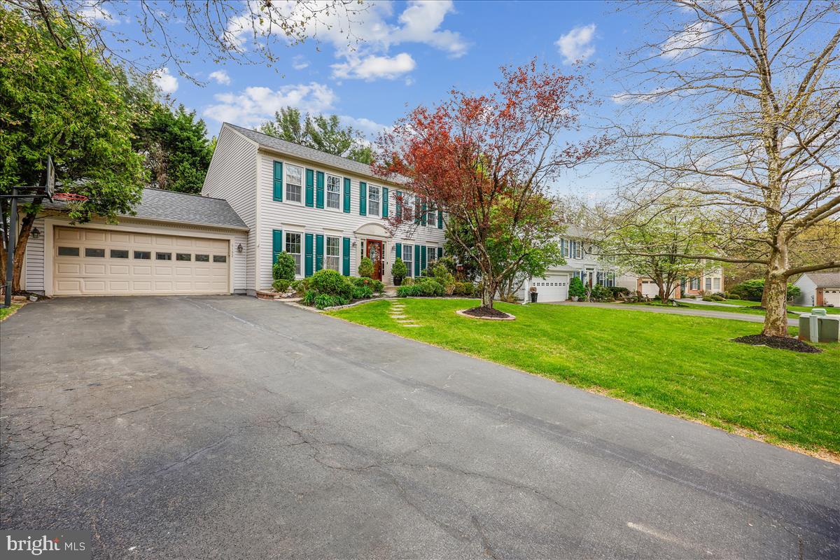 6132 Cornwall Terrace Frederick, MD 21701 - Photo 39 of 48 a view of a house with a yard