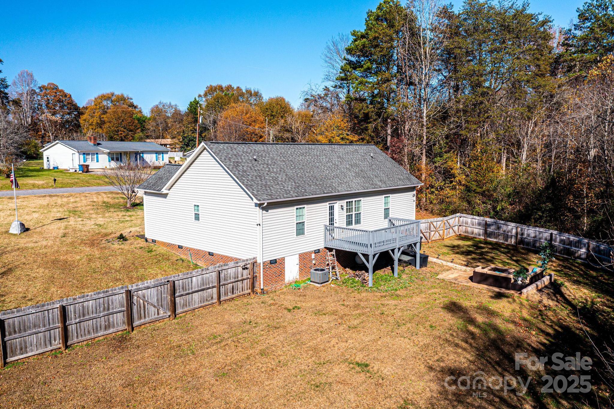 1781 Herbie Circle Newton, NC 28658 - Photo 36 of 38 a view of a house with backyard and sitting area