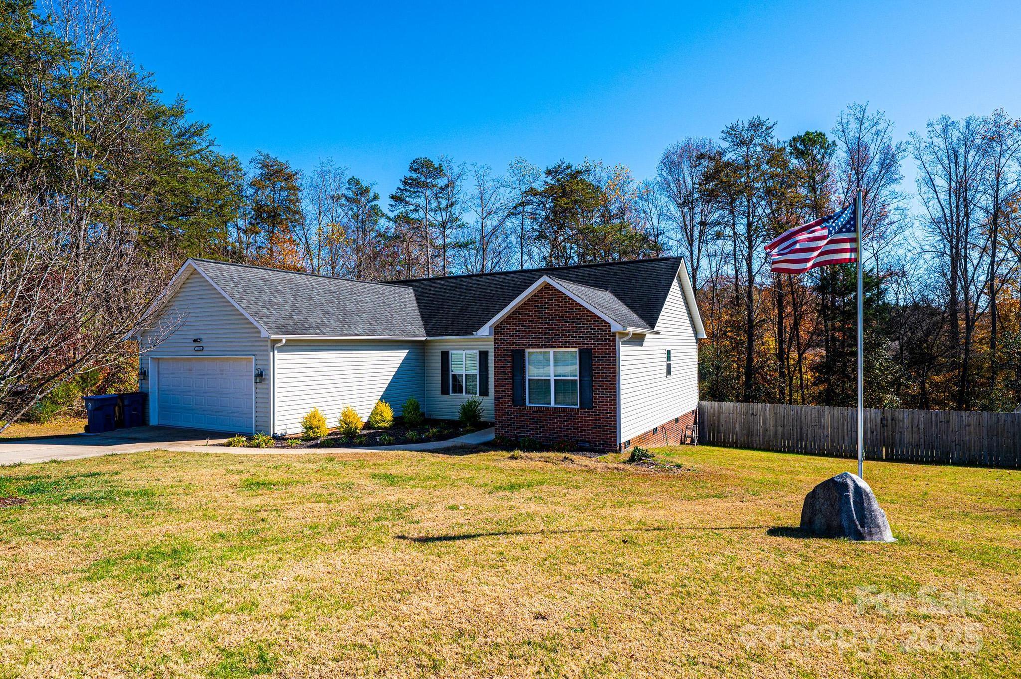 1781 Herbie Circle Newton, NC 28658 - Photo 38 of 38 a view of swimming pool with a house in the background