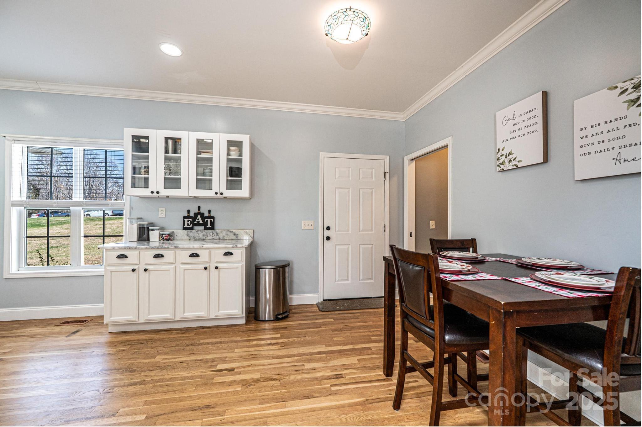 1781 Herbie Circle Newton, NC 28658 - Photo 9 of 38 a view of a kitchen with furniture and wooden floor