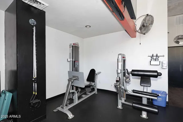 a view of a city street lined with tall buildings