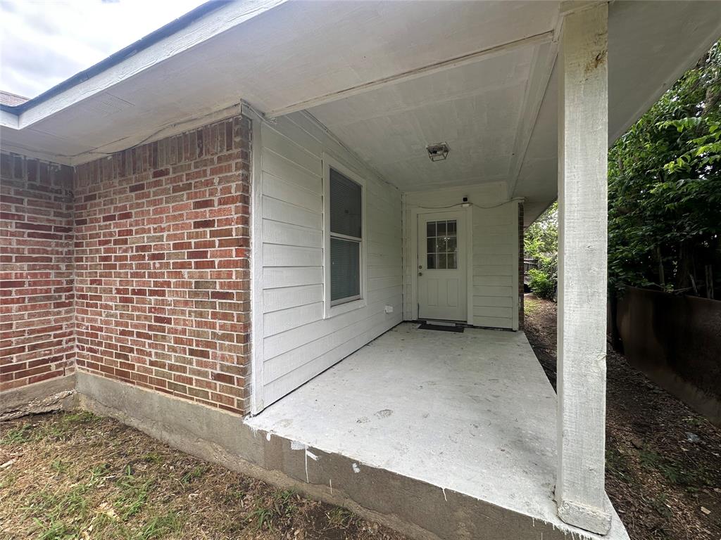 4147 Gladewater Road Dallas, TX 75216 - Photo 29 of 31 a view of a door