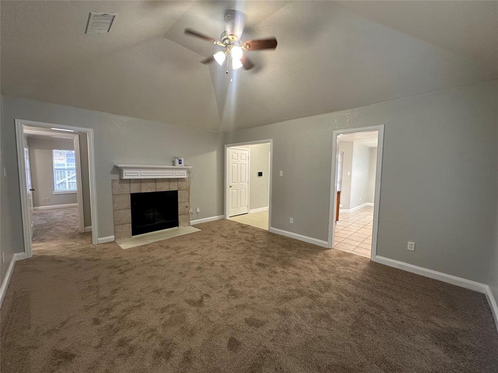 4147 Gladewater Road Dallas, TX 75216 - Photo 6 of 31 a view of empty room with fireplace