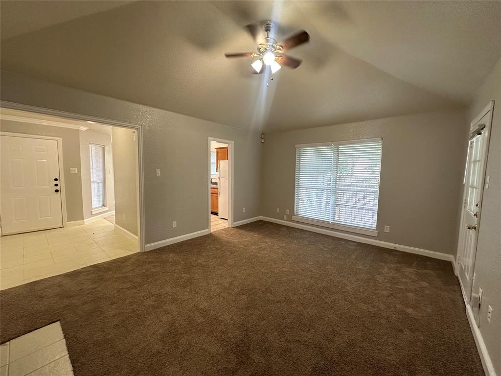 4147 Gladewater Road Dallas, TX 75216 - Photo 7 of 31 a view of an empty room with a window