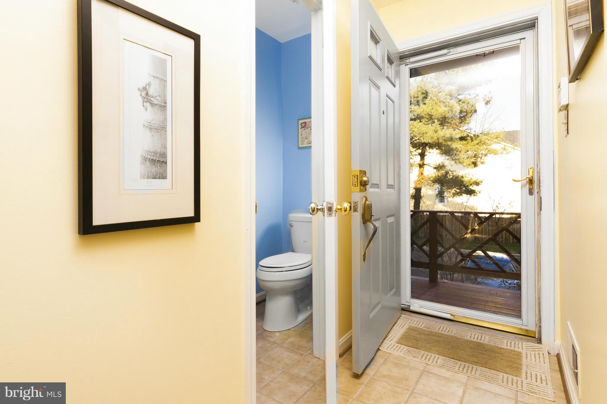 2005 Lyttonsville Road Silver Spring, MD 20910 - Photo 2 of 16 a bathroom with a shower and a toilet