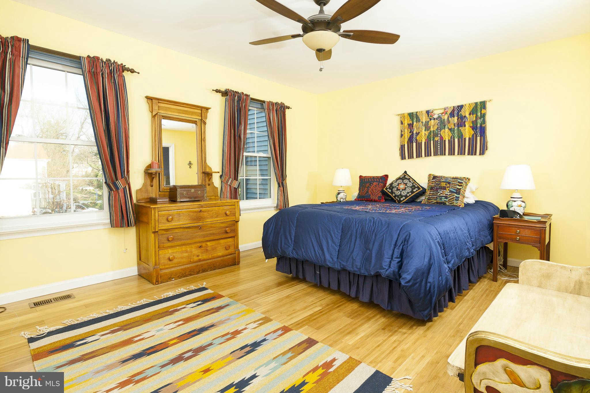 2005 Lyttonsville Road Silver Spring, MD 20910 - Photo 12 of 16 a bedroom with a bed and a window