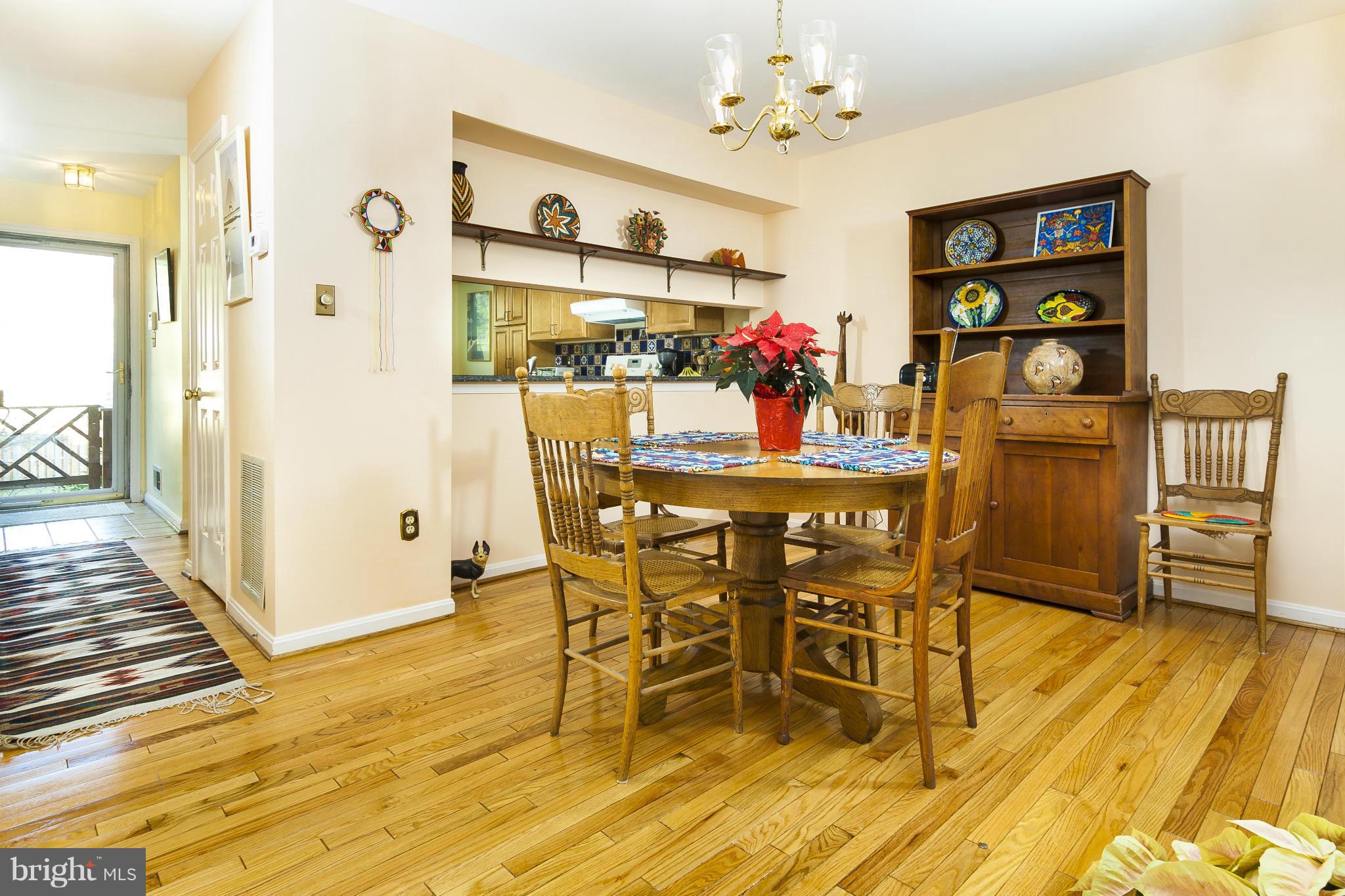 2005 Lyttonsville Road Silver Spring, MD 20910 - Photo 7 of 16 a view of a dining room with furniture and wooden floor