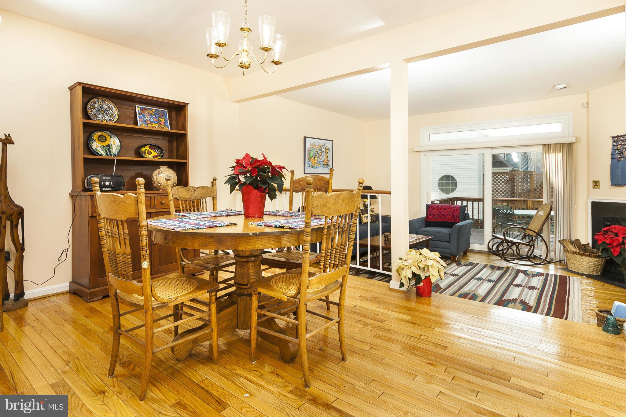 2005 Lyttonsville Road Silver Spring, MD 20910 - Photo 8 of 16 a view of a dining room with furniture and a chandelier