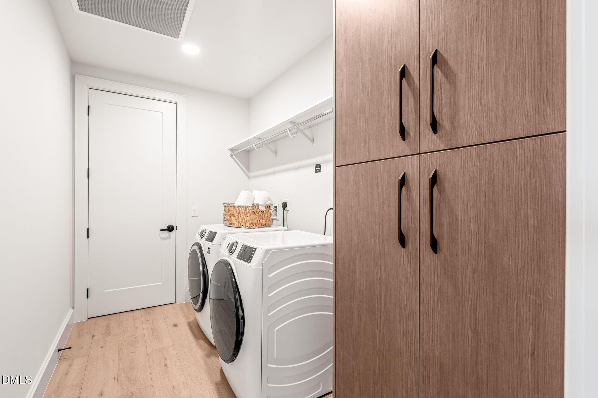 115 Morris Street, Unit 2501 Durham, NC 27701 - Photo 27 of 76 a view of a storage & utility room with washer and dryer